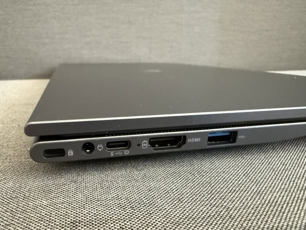 Visible ports from left to right include a Kensington security slot, DC power input, USB-C port, HDMI port, and a USB Type-A port.