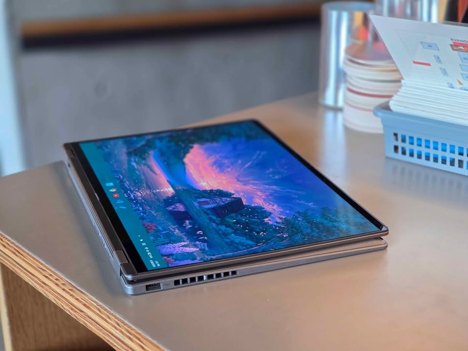 Lenovo 2-in-1 laptop folded completely flat into tablet mode during a foldable hinge test.
